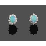 A Pair of 9 Carat Gold Opal and Diamond Cluster Earrings, an oval cabochon opal within a border of