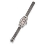 A Lady's Art Deco Tonneau Shaped Wristwatch, circa 1930, lever movement, silvered dial with Arabic