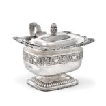 An Edward VII Silver Mustard-Pot, by John Bodman Carrington, London, 1902, oblong and on spreading