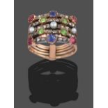 A Multi-Gemstone Stacking Ring, formed of five bands each set with alternating round cut sapphire,
