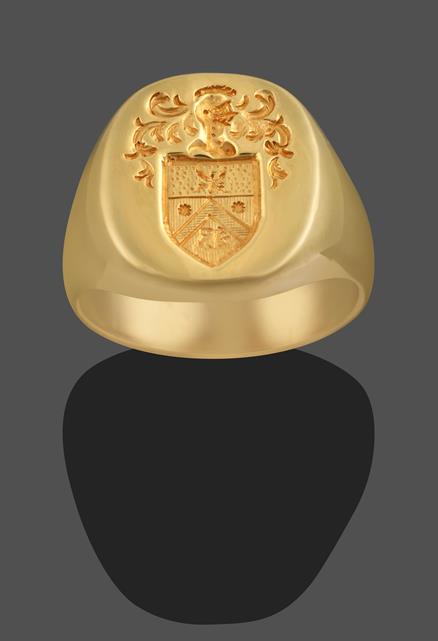 A Signet Ring, the yellow engraved seal depicting a bee above a chevron, flanked by two sun motifs