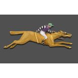 A Racehorse and Jockey Brooch, realistically modelled as a galloping horse, the jockey enamelled