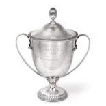 An Edward VII Silver Trophy-Cup, by Elkington and Co., Birmingham, 1908, tapering and on spreading