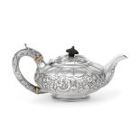 A George IV Silver Teapot, Maker's Mark IB, London, 1824, compressed circular and on collet foot,