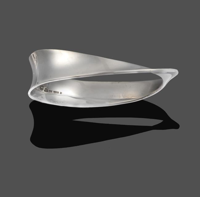 A 'Mobius' Bangle, by Georg Jensen, of asymmetric polished form, numbered 206, inner measurements