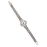 A Lady's Diamond Set Wristwatch, circa 1955, lever movement, silvered dial with Arabic numerals,