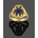 An 18 Carat Gold Sapphire Ring, the oval cut sapphire in a fancy yellow claw setting, to a