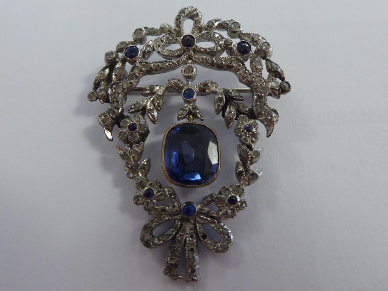 A Synthetic Sapphire and Diamond Garland Brooch, with bow, foliate and swag motifs, measures 3.5cm - Image 3 of 5