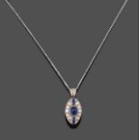 An Art Deco Sapphire and Diamond Pendant on Chain, the round cabochon sapphire flanked by pairs of