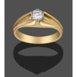 A 9 Carat Gold Diamond Solitaire Ring, the round brilliant cut diamond in a white rubbed over an