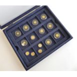 14 x Miniature Commemorative Gold Coins comprising: Australia 5 x 5 dollars 2000(x2), 2001, 2002 &