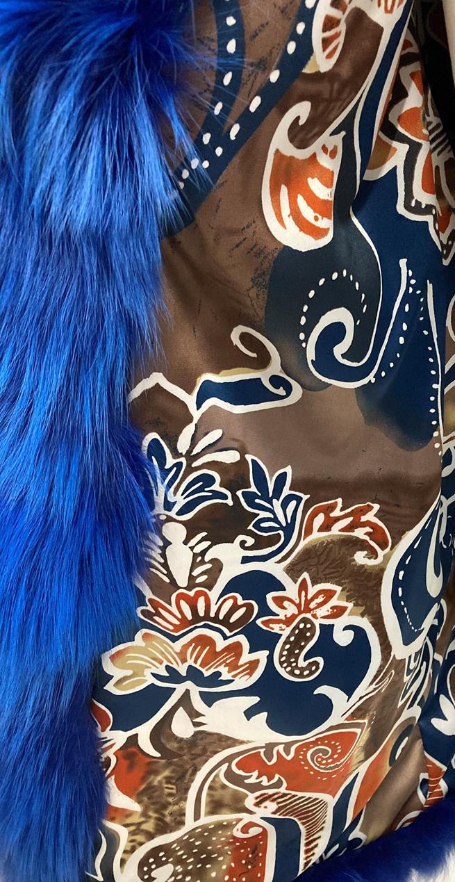 An Italian Dyed Blue Fox Fur Coat, with 3/4 length sleeves and slit pockets, lined in floral silk. - Image 2 of 3