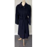 A Burberrys Lady's Dark Blue Wool 3/4-Length Belted Coat, 1980s/1990s, with concealed button