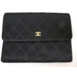 A Circa 1994-1996 Chanel Black Satin Quilted Clutch Bag, with diamante set gilt interlocking 'CC'