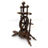 Circa 1900 Black Forest Treen Miniature Spinning Wheel, with baluster turned uprights and carved
