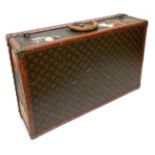 Louis Vuitton LV Monogrammed Leather Mounted Hinged Suitcase, with brass lock and fittings all