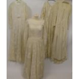 Assorted 1930/1950s Wedding Dresses, including a plain cream silk long sleeve dress with a v