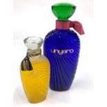 Ungaro Large Advertising Display Dummy Factice, the purple glass bottle moulded with 'draping', with