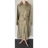 A Burberrys Lady's Light Khaki Double Breasted Belted Trench Coat, 1980s/1990s, with signature check