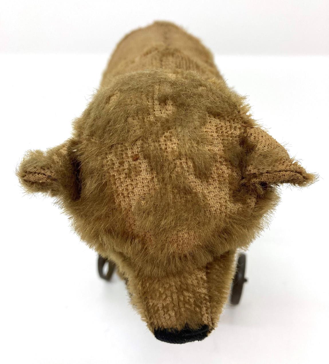 An Early 20th Century Steiff Pull Along Bear on Wheels, with jointed head, boot button eyes, - Image 4 of 4