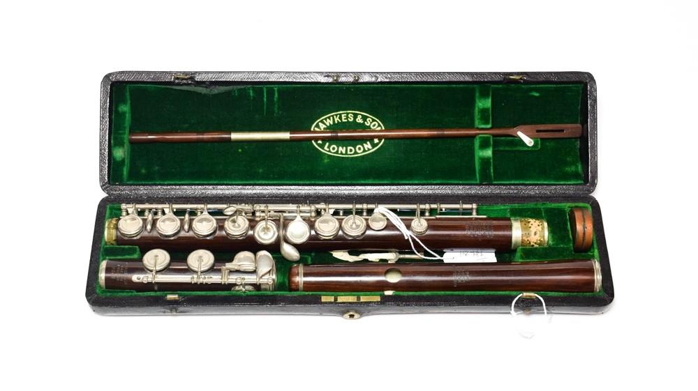 Hawkes & Son Flute wooden stamped 'Excelsior Sononous Class, Hawkes & Son Makers London 9043',