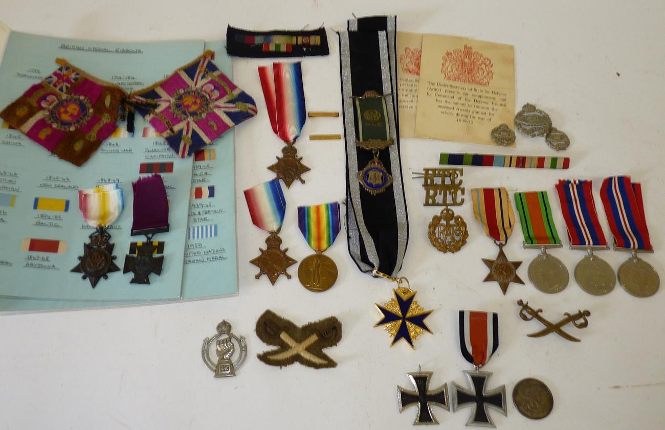 A Collection of Various Medals and Badges, including:- a 1914-15 Star and Victory Medal awarded to