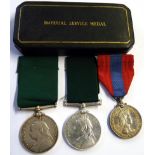 Two Volunteer Long Service Medals, (Victoria Regina), un-named; an Imperial Service Medal, (