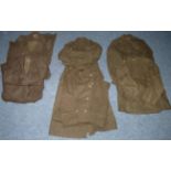 Two Second World War Officer's Greatcoats, one to a Captain, Royal Artillery, with brass rank pips