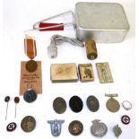 A Small Collection of German Third Reich Militaria, including a Winter Campaign in Russia medal with