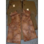 A Second World War Leather Jerkin, with green wool blanket lining and four brown plastic buttons