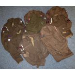 A Second World War Battledress Blouse, to a Sergeant, Royal Artillery, with embroidered insignia and