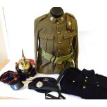 A First World War Corporal's Khaki Tunic to the Border Regiment, with brass buttons and shoulder