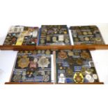 A Collection of Militaria Relating to the Border Regiment, comprising cap and collar badges,