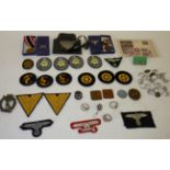 A Collection of German Third Reich Militaria, including two War Merit medals, a Luftschutz Tutnot