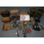 Five Second World War Gas Masks, with two webbing cases; also, eight 1970's/80's gas masks and six