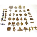 A Collection of Approximately of Forty Mainly Second World War British Badges, including cap, collar