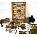 A Quantity of Militaria, comprising First and Second World War battlefield relics including a framed