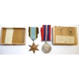 An Air Crew Europe Star and War Medal, with medal slip in Air Ministry box of issue addressed to J