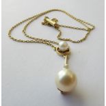 A Cultured Pearl Necklace, drop length 2.5cm, necklace length 41cm . Clasp stamped '15CT'. Gross