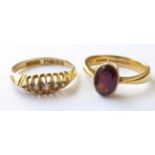 A 22 Carat Gold Garnet Ring, finger size N1/2; and An 18 Carat Gold Diamond Five Stone Ring,