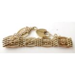 A 9 Carat Gold Fancy Link Bracelet, with 9 carat gold padlock clasp, length 20cm . Gross weight 28.3