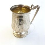 A Victorian Silver Mug, maker's mark ?&T, Birmingham, 1868, baluster and on spreading foot, with