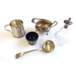 A Collection of Silver, including: a sauceboat on three pad feet and with leaf-capped handle, with