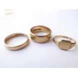 Two 9 Carat Gold Band Rings, finger sizes P and Q; and A 9 carat Gold Signet Ring, finger size L.