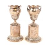 A Pair of Edward VII Silver Vases on Stands, by Thomas Bradbury and Sons, Sheffield, 1903, the vases