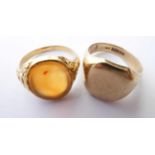 A 9 Carat Gold Signet Ring, finger size Q; and Another Hardstone Signet Ring, unmarked, finger