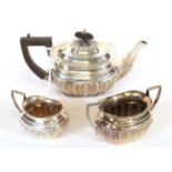 A Three-Piece Edward VII Silver Tea-Service, by William Aitken, Birmingham, 1902 and 1904, each