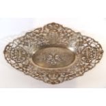 A German Silver Dish, Stamped 800, shaped oval, the sides pierced with fruiting vines and birds, the