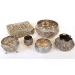 A Collection of Indian or Burmese White Metal Items, 20th century, comprising: four various bowls,