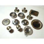 A Collection of Silver, including: a set of three silver and glass candlesticks; a pair of silver